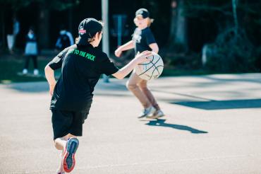 Boys playing basketball