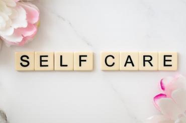 self care spelt with scrabble tiles