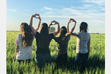 Students standing in a field